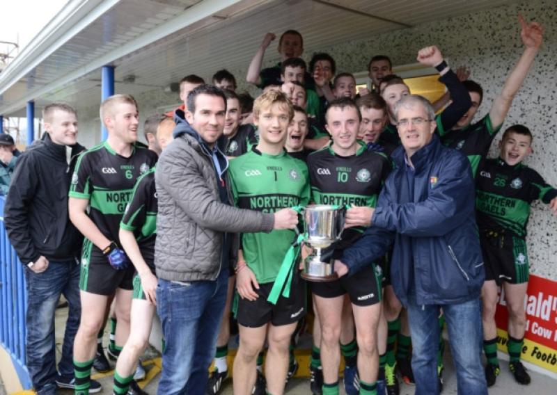 Patrick Hanlon of Hanlon's Gala (the sponsor of the Minor 'A' Football Championship) and County Board Coaching Officer Tommy McLoughlin (right) presenting the Harte Cup to Luke Meehan and Nigel Rabbitte, the joint captains of the victorious Northern Gaels squad who beat Clonguish Og 2-17 to 0-4 in the final replay at Glennon Brothers Pearse Park on Saturday evening last. Photo: Declan Gilmore Photography