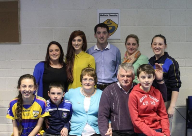 A celebration in honour of Abby Brady was held by Mullahoran GAA last Thursday night. Abby is pictured with her husband John Joe, her children Yvonne, Margaret, Aine, Sean Og, and Amanda, and grandchildren Abby, Calvin, and Nathan. Abby will receive her Hall of Fame Award on Saturday night. Photo: Mullahoran Dreadnaughts