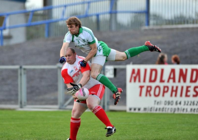 Abbeylara's Niall Sheridan battles with Daniel Keogh of Killoe during the 2012 Senior Football Championship Quarter Final.