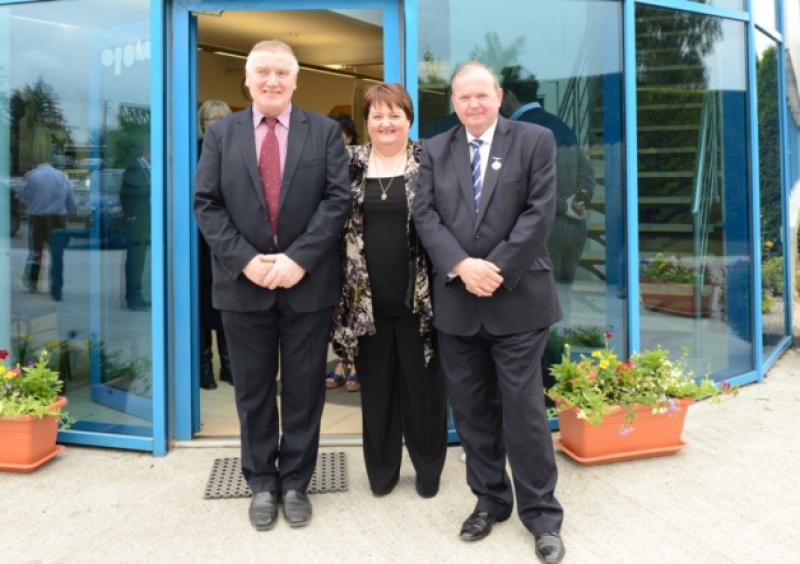 Frank and Dolores Kiernan, founders of Kiernan Structural Steel, pictured in front of the company headquarters for their recent 25th anniversary celebrations along with President of the GAA, Liam O'Ne
