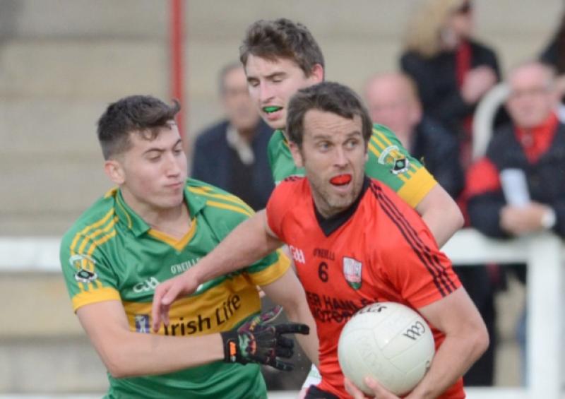 Cashel defender Padraig Farrell clearing the danger in evading the challenge of Ardagh St Patrick's forward Rory Sullivan. Action from the Intermediate Football Championship game at Leo Casey Park.  Photo: Declan Gilmore