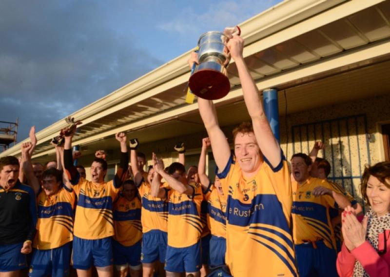 Delighted Carrickedmond captain Barry O'Farrell raises the Gerry Hennessy Cup after his club won the Intermediate Football Championship Final replay at Glennon Brothers Pearse Park on Saturday evening. Photo: Declan Gilmore