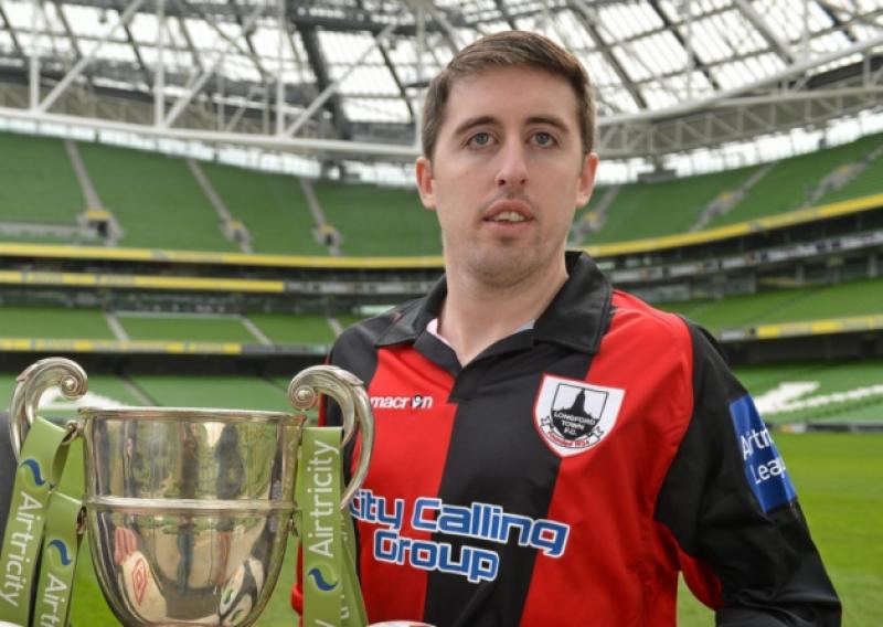 Longford Town captain Mark Salmon, pictured with the First Division league trophy at the Aviva Stadium, is looking forward to the Leinster Senior Cup Final against St. Patricks Athletic next week. Photo: Sportsfile