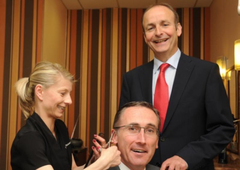 Fianna Fail by-election candidate Aengus O'Rourke stopped off for a haircut while visiting Longford with party leader Micheal Martin earlier this week.