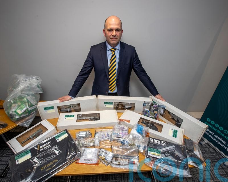 Guns and swords seized in operation targeting organised crime gang