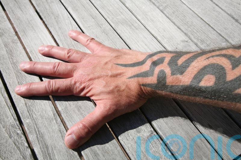 Garda’s policy of no visible tattoos to be retained, says Harris