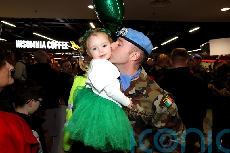Cheers and emotional reunions as Irish peacekeepers touch down on home soil