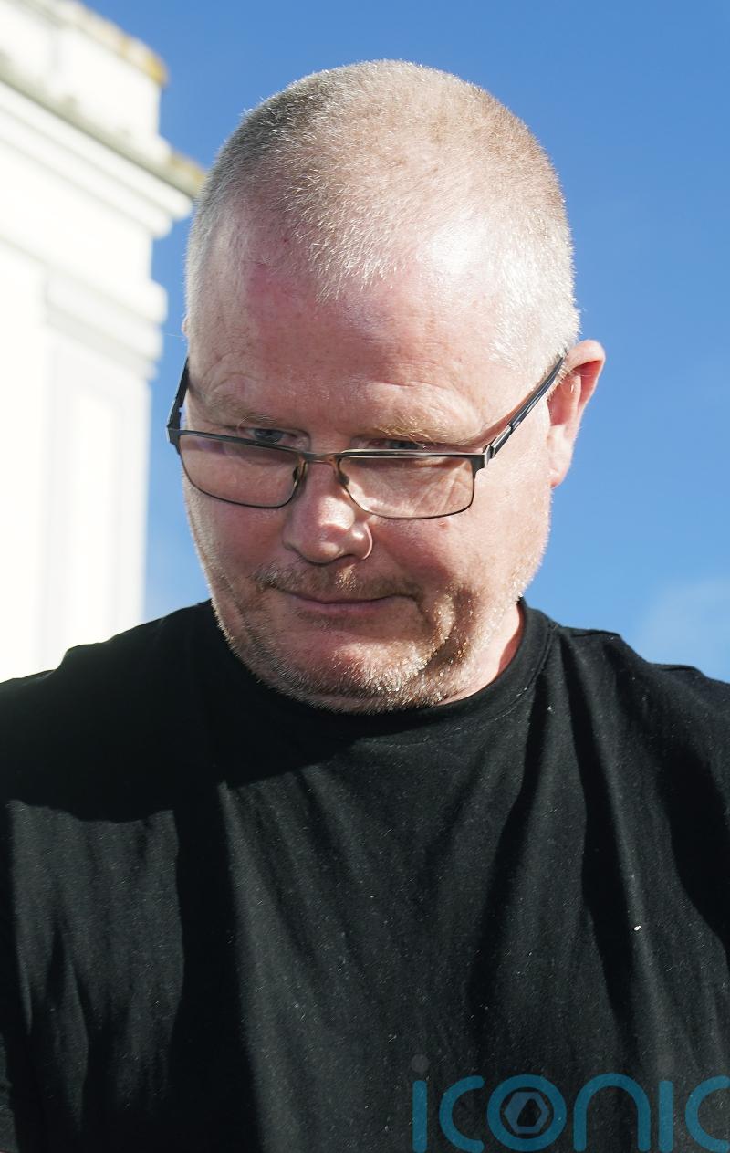 Murder accused &lsquo;held and and kissed&rsquo; his wife moments after she died, court told