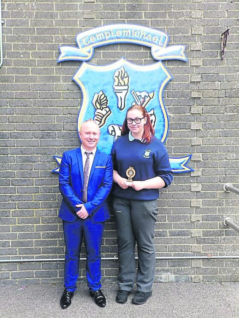 Gemma Skelly receiving an award for Best Junior Certificate Results 2018 from Mr McCabe