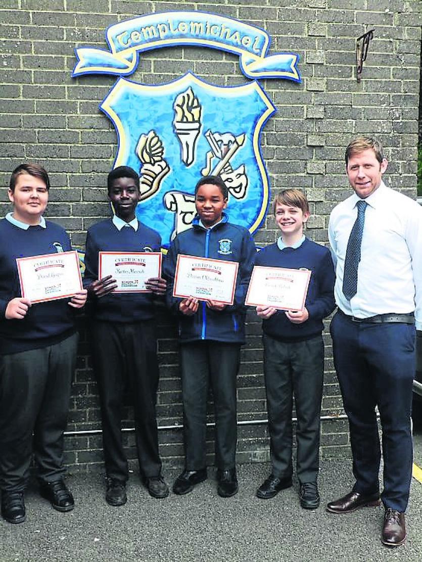 David Gagiuc, Kurtis Mensah, Darren Okhuakhua and Bartek Pabic receiving certificates for their participation in the competition 'Schools Digital Cham