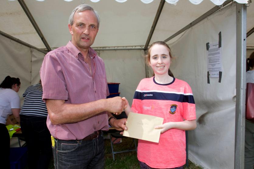 Most appropriately dressed teen Orla Kelleghan and Chairman Charlie Murphy. PICTURE: MICHELLE GHEE.