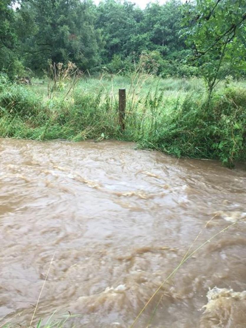 GALLERY | Flooding hell: Ballinalee resident feeling a bit safer as Longford County Council bring sand bags to combat flood threat