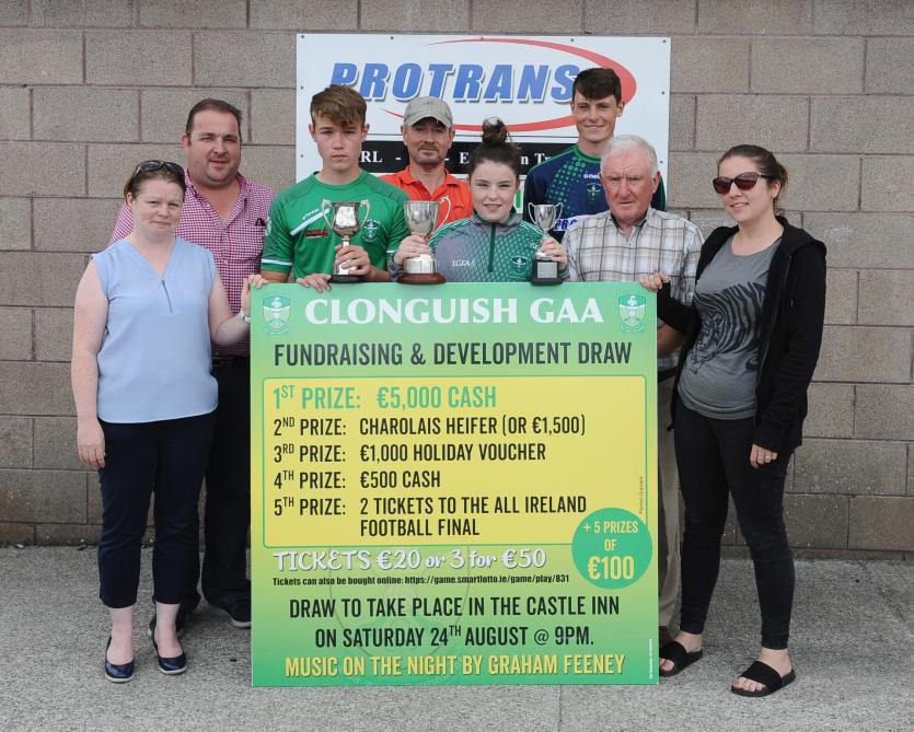 Burke (parent) Emma Shannon (player), Ronan Sweeney (player), Tim Shanley (chair) and Michelle McMorrow (committee) lend their services to showcase th