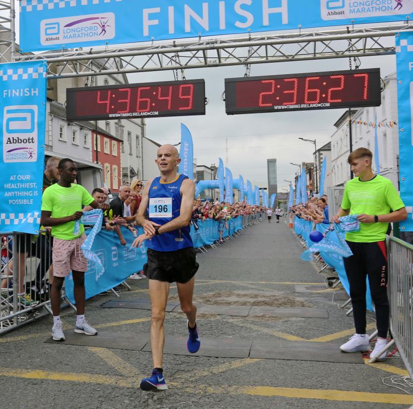 Abbott Longford Marathon produces historic double as local athletes Barry Sheil and Niamh Kiernan triumph  
