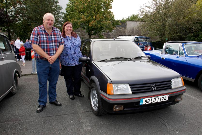Derek and Diane Stewart with there Peugeot 205 GTI from 1988. PICTURE: MICHELLE GHEE.