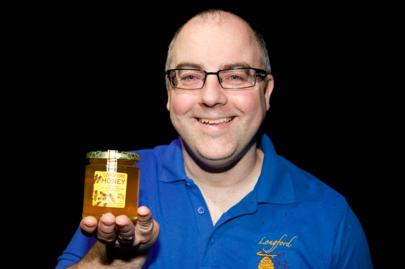 Robert with some of his prized honey Picture: Michelle Ghee
