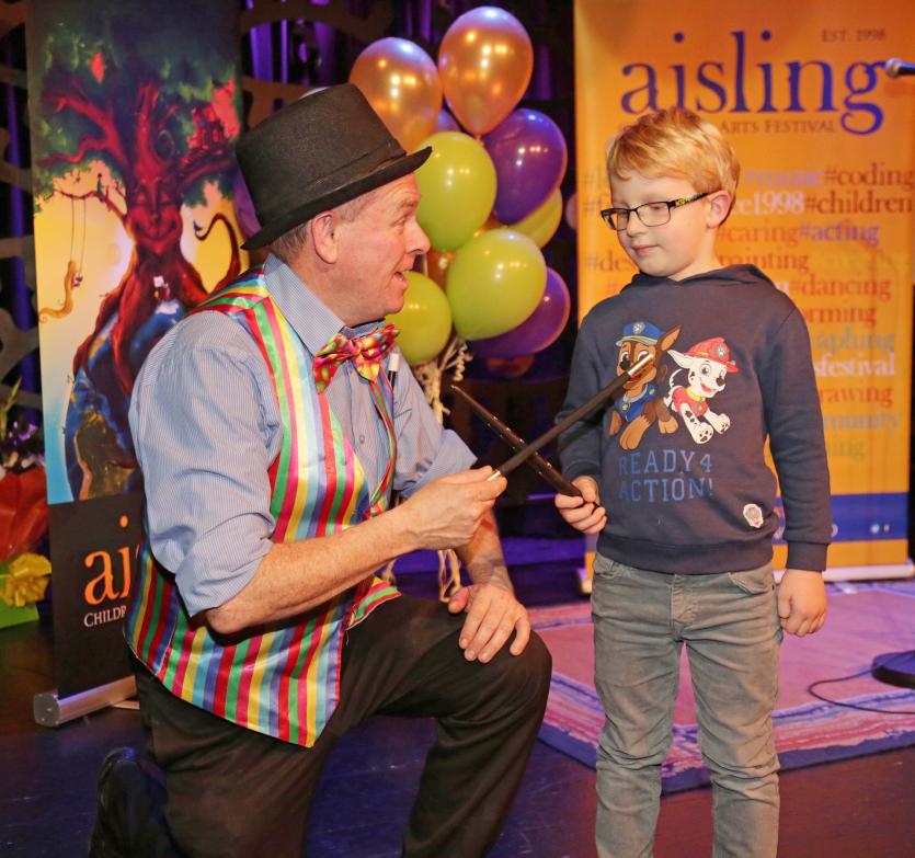 Leon  Glogowska with the magician Picture: Shelley Corcoran