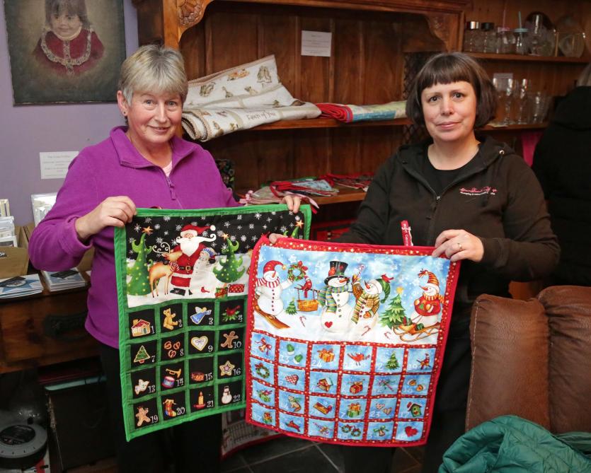 Bridget McBride and Amy French showcase some of their homemade advent calendars  PICTURE: SHELLEY CORCORAN