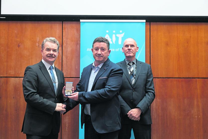 Tony Kilkenny, a Bachelor of Arts in Applied Social Studies students from Ballymahon, receiving an award for his outstanding scholarship