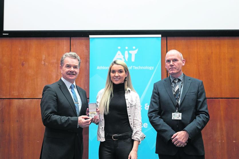 Danielle Downes Killashee, a Bachelor of Science (Hons) in Applied Psychology student, receiving an award for her outstanding academic achievement.