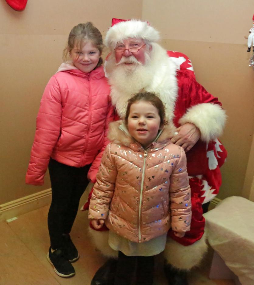 Santa with Indie and Arlene Horgan Picture: Shelley Corcoran
