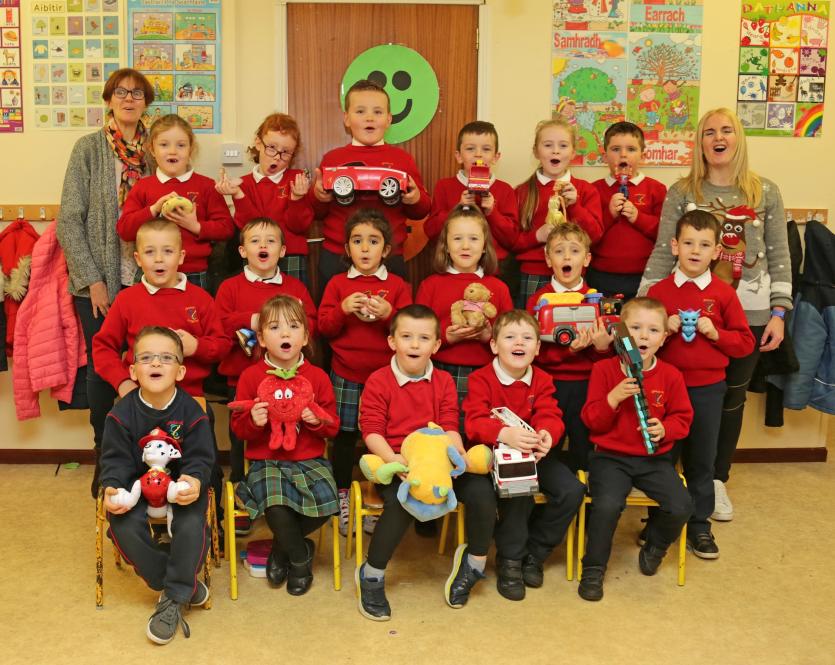 Teachers; Mary Corkery and Anne Hartnett Murtagh with Gaelscoil students showing their favourite toys and singing Ho, Ho, Ho Picture: Shelley Corcoran