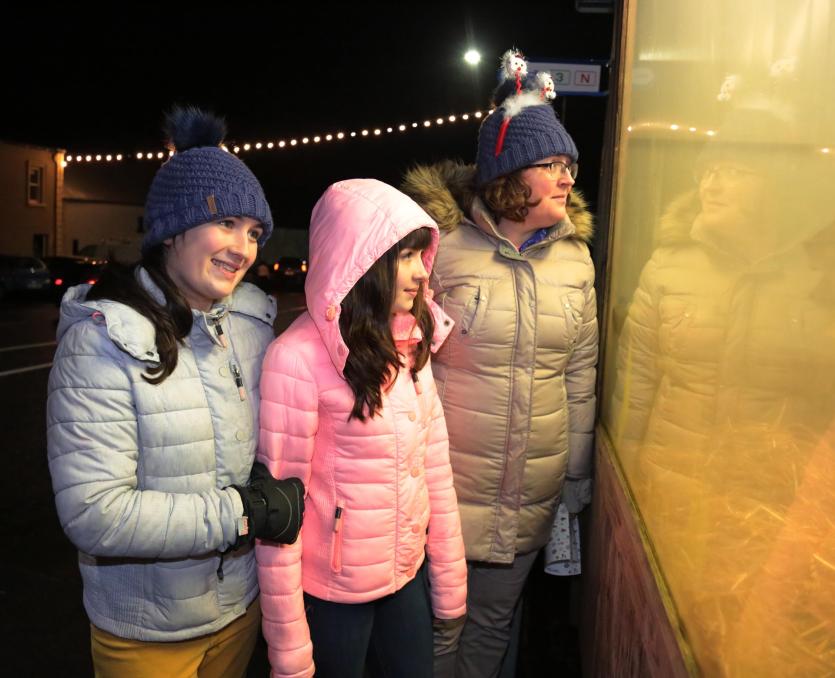Looking at the nativity, Christina, Grainne and Niamh Grier Picture: Shelley Corcoran