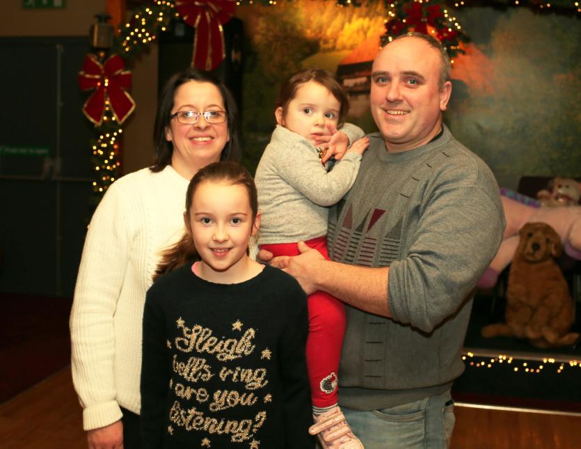 ILOL-20-12-19 Kenagh Santa 08.     Lizzy, Niamh, Aoife & Brian Egan of Egan Tyres & Shop, Terlicken, Ballymahon              Picture: Syl Healy.