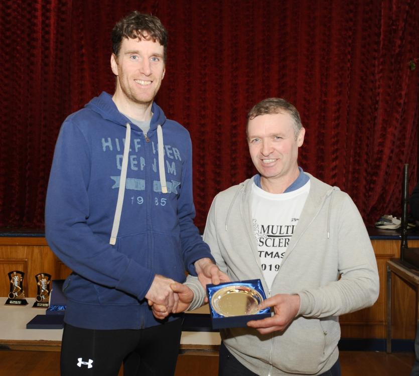 Matthew Thompson presents  3rd Male Home Martin Gillen  at the Christmas Day Run  PICTURE DECLAN GILMORE