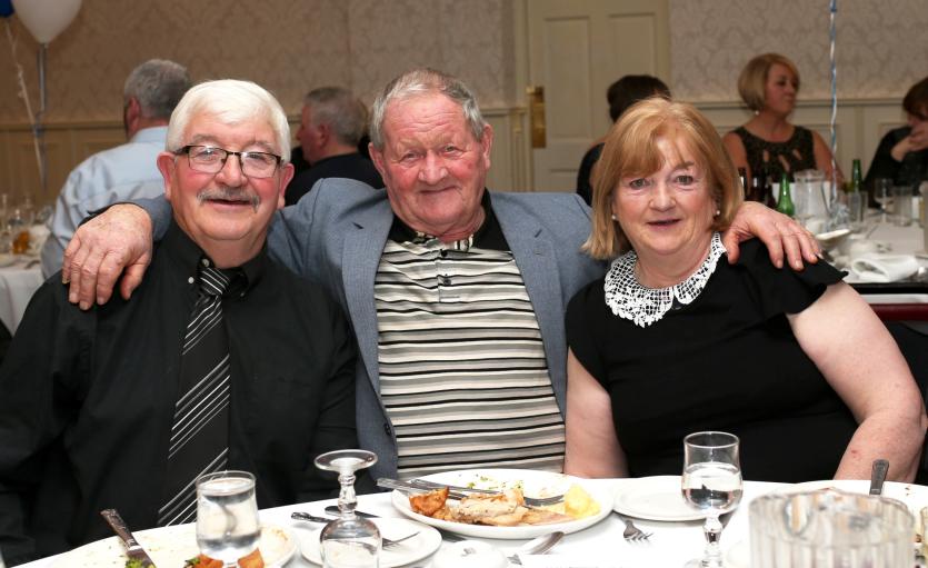 Patsy & Ann Hynes with Rogie Martin (centre).        Picture: Syl Healy.