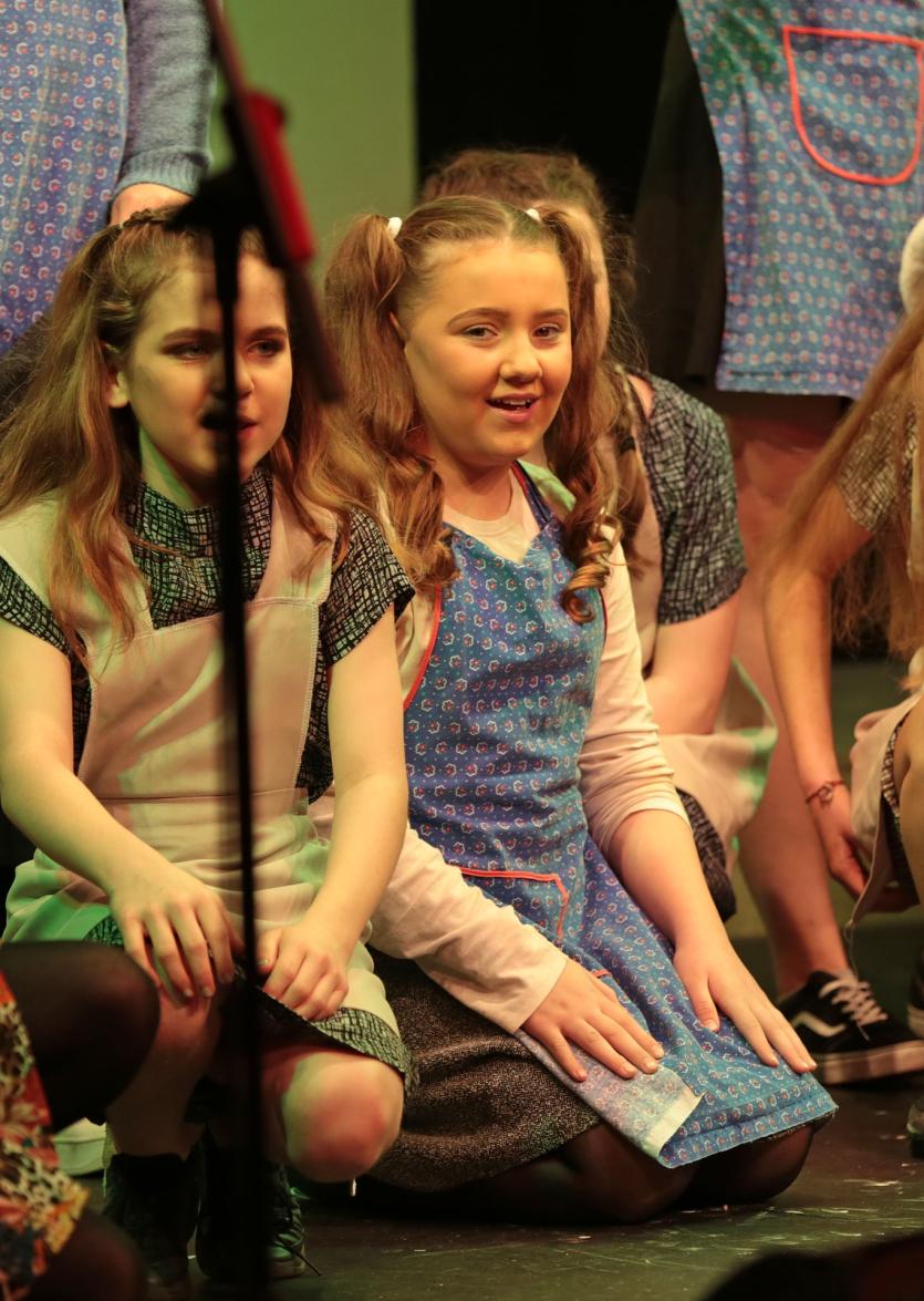 1st year students perform It's a Hard Knock Life from Annie