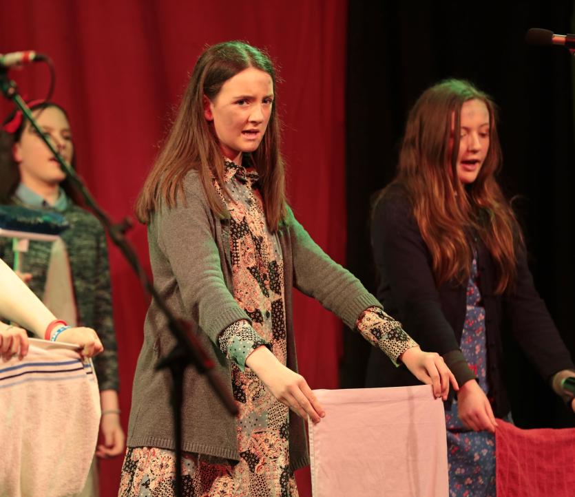 1st year students performing It's a Hard Knock Life from Annie