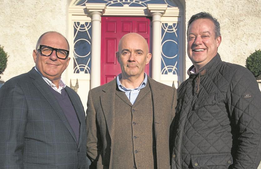 Architect Hugh Wallace pictured outside Kilglass house near Legan, Co Longford, with owners Ronan Daly and Charles Lambert ahead of their TV appearanc