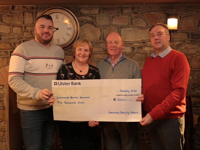 Kevin Hussey, Christine and Brian Murray (Longford Variety Group), with Dan Rooney (Longford Hospice Homecare) Picture: Shelley Corcoran