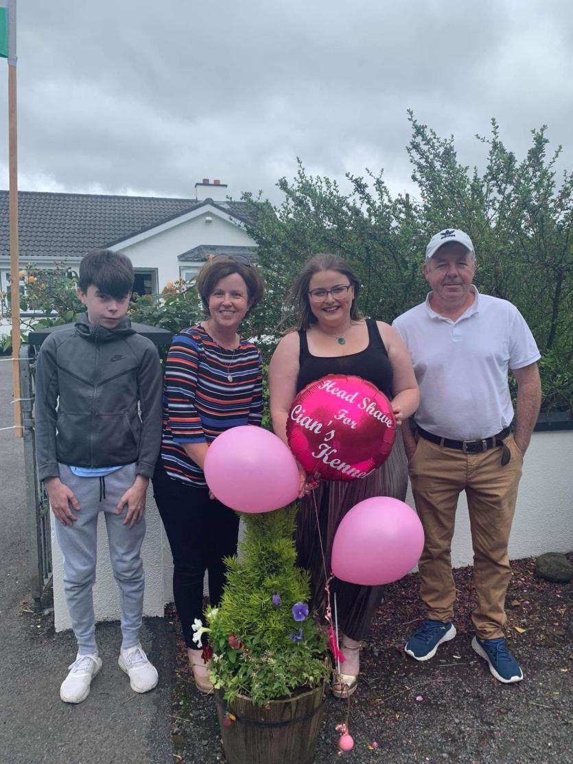 Longford girl Michaela Cox celebrates 24th birthday by shaving her hair off for charity
